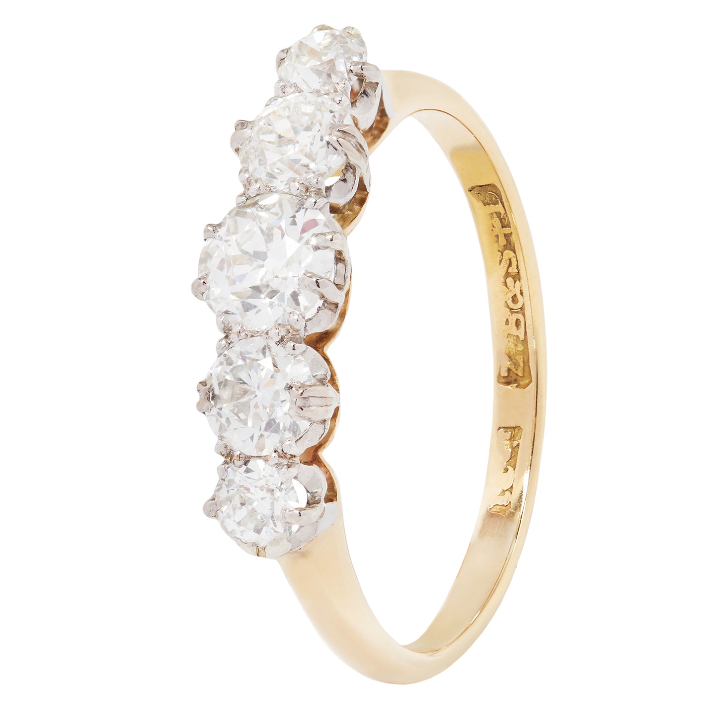 Gold ring with four diamonds on a white background