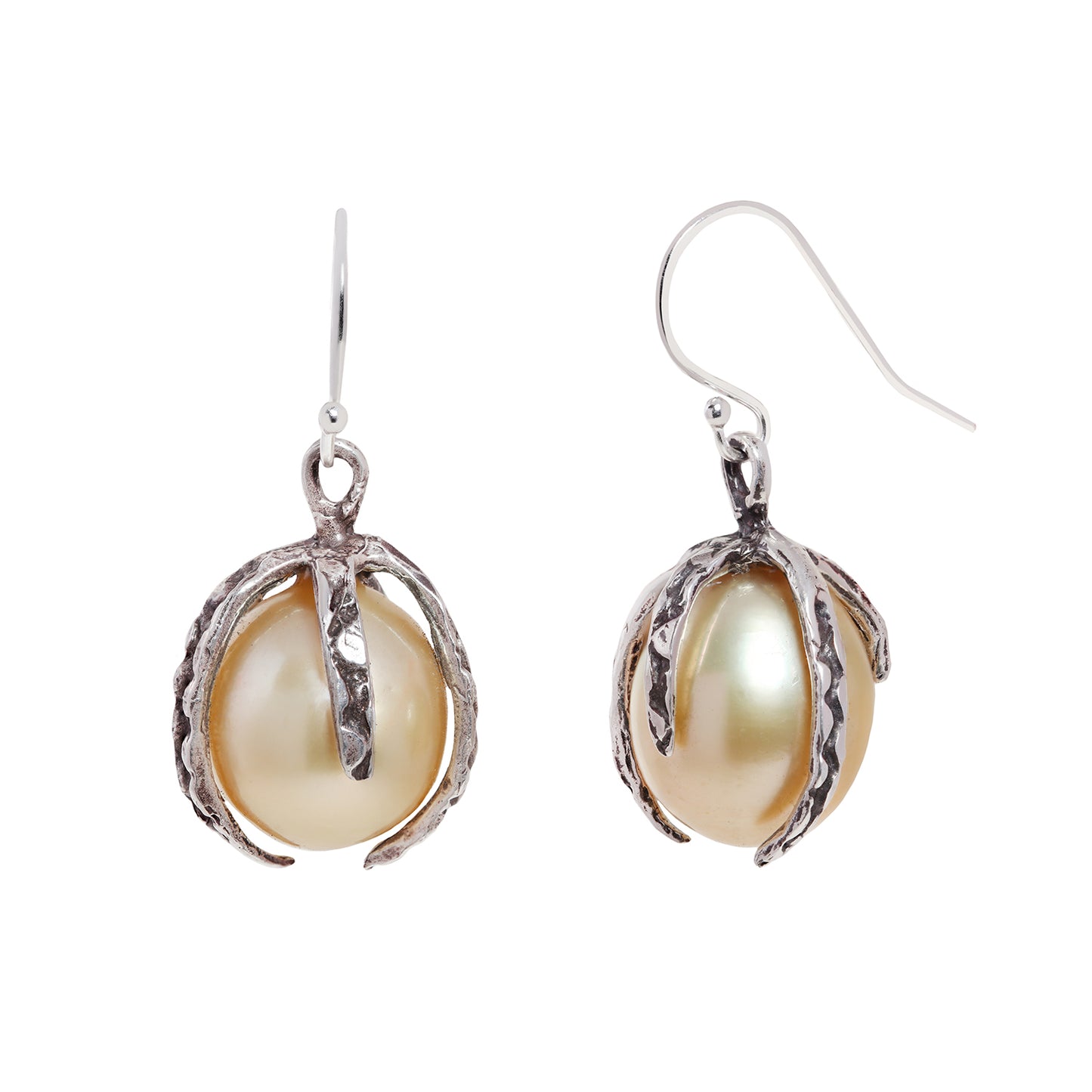 A pair of darkened silver drop earrings featuring large, lustrous baroque pearls nestled in textured, claw-like settings, shown against a plain white background.