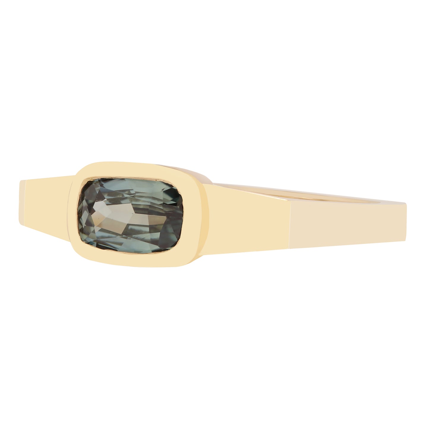 Lauren Wolf - Gold ring with a green gemstone on a white background