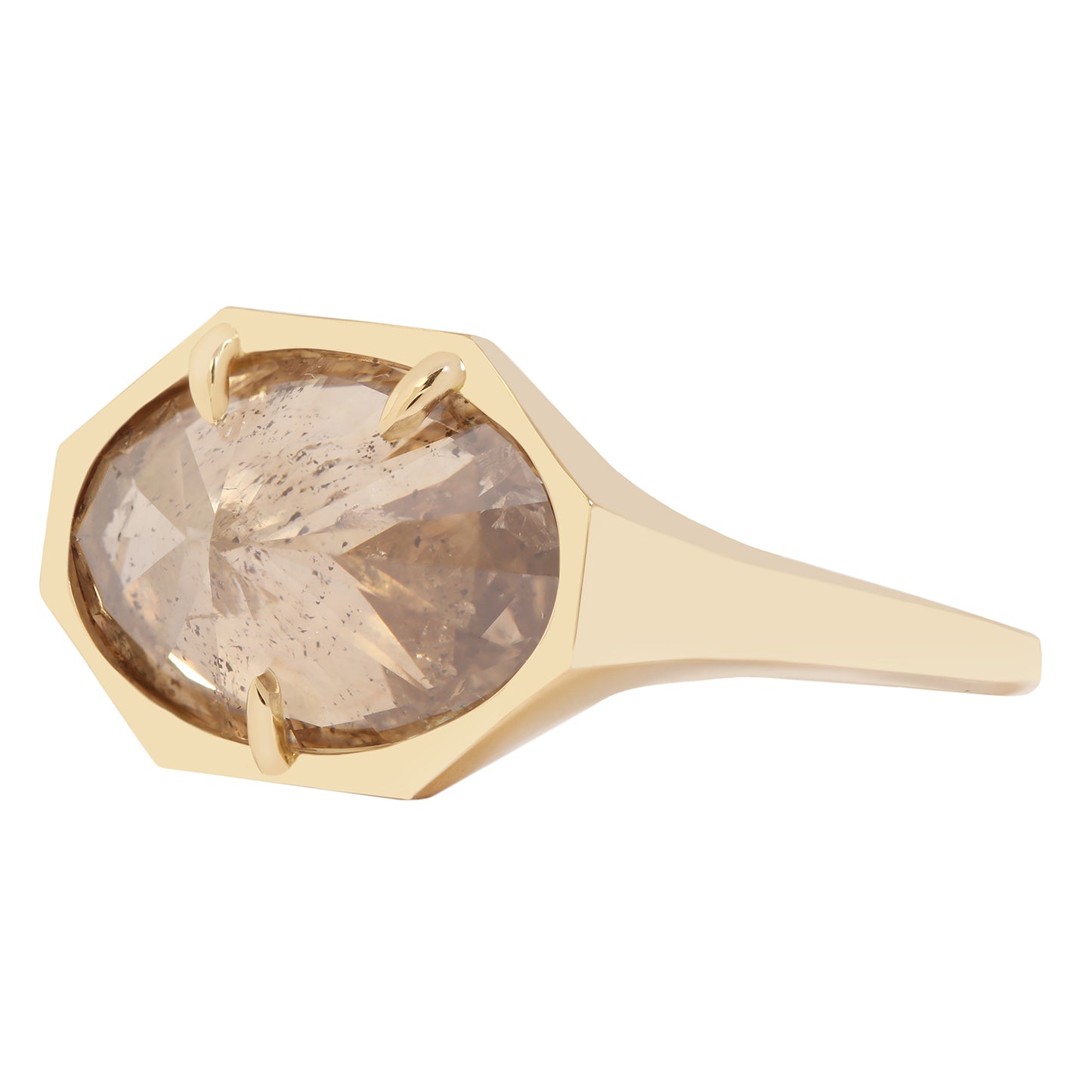 Lauren Wolf - Gold ring with a large, faceted smoky diamond on a white background