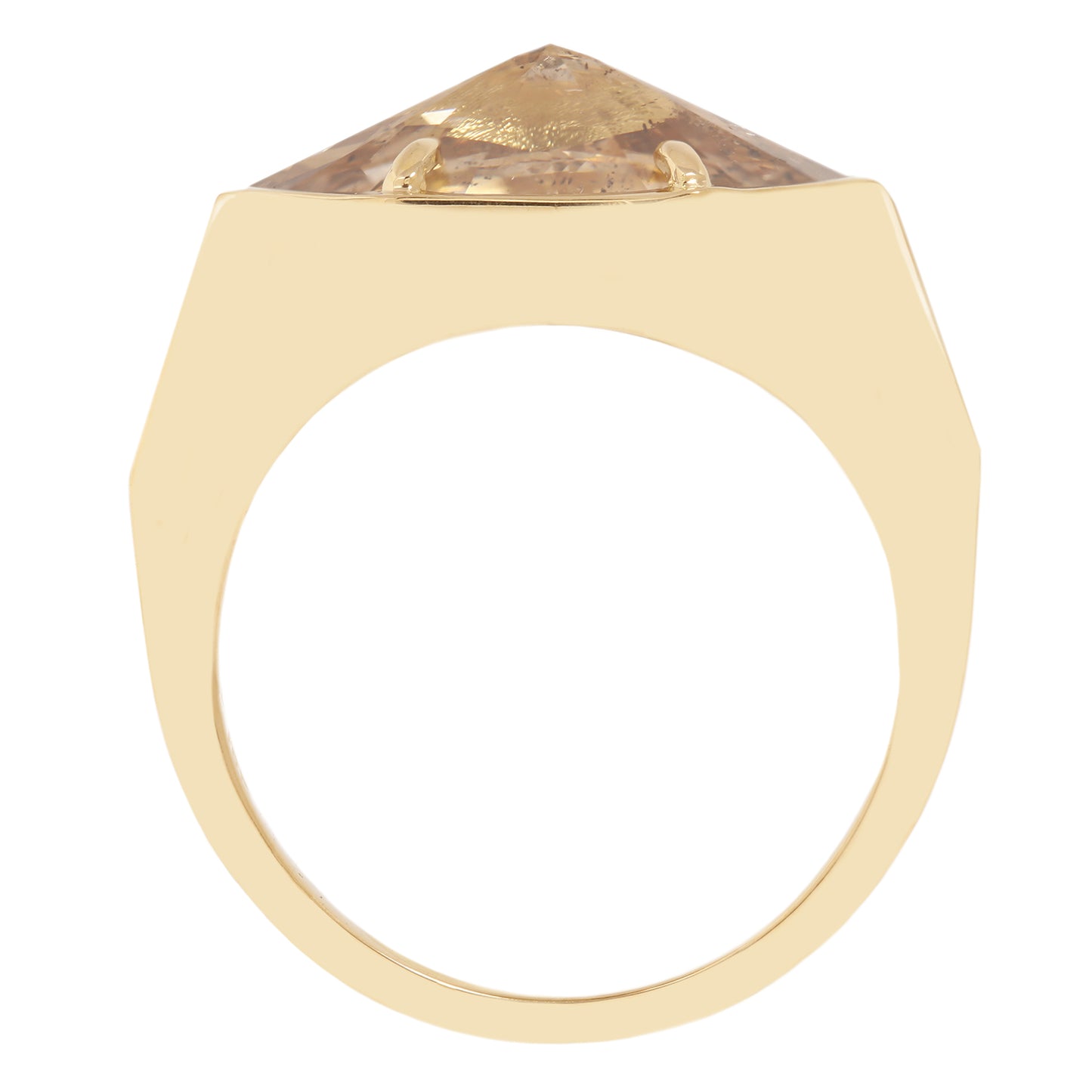 Lauren Wolf - Gold ring with a large, faceted diamond on a white background