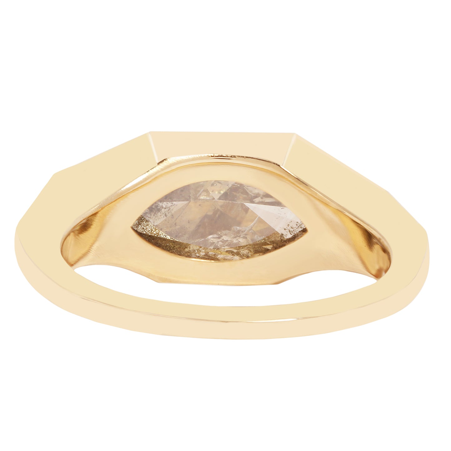 Lauren Wolf - Gold ring with a brown gemstone on a white background