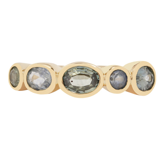 Lauren Wolf - Gold ring with five green gemstones on a white background