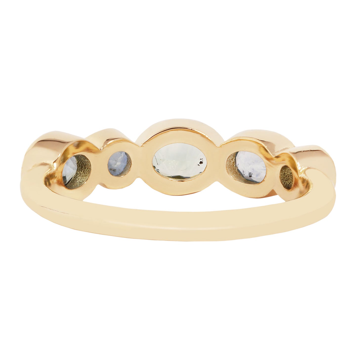 Lauren Wolf - Gold ring with embedded stones on a white background