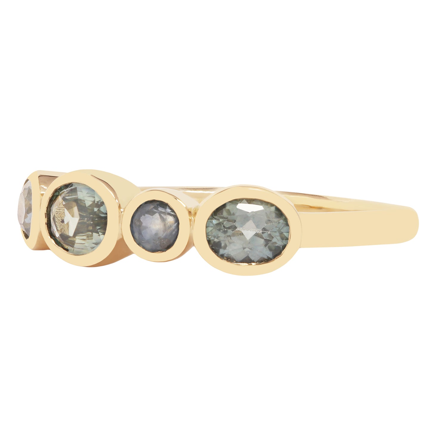 Lauren Wolf - Gold ring with multiple circular gemstones on a white background