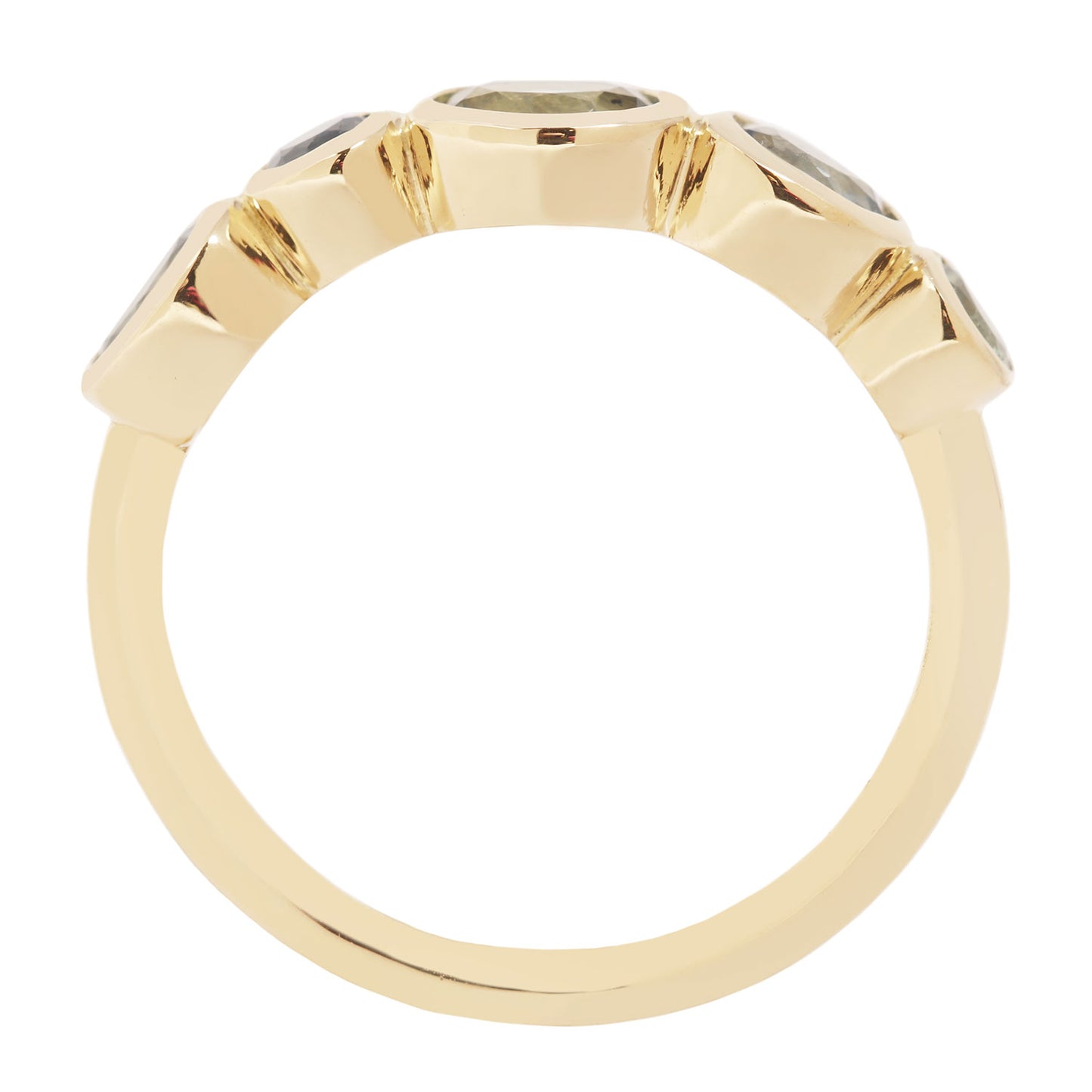 Lauren Wolf - Gold ring with gemstones on a white background