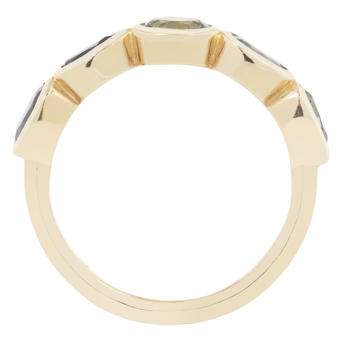 Gold ring with embedded stones on a white background