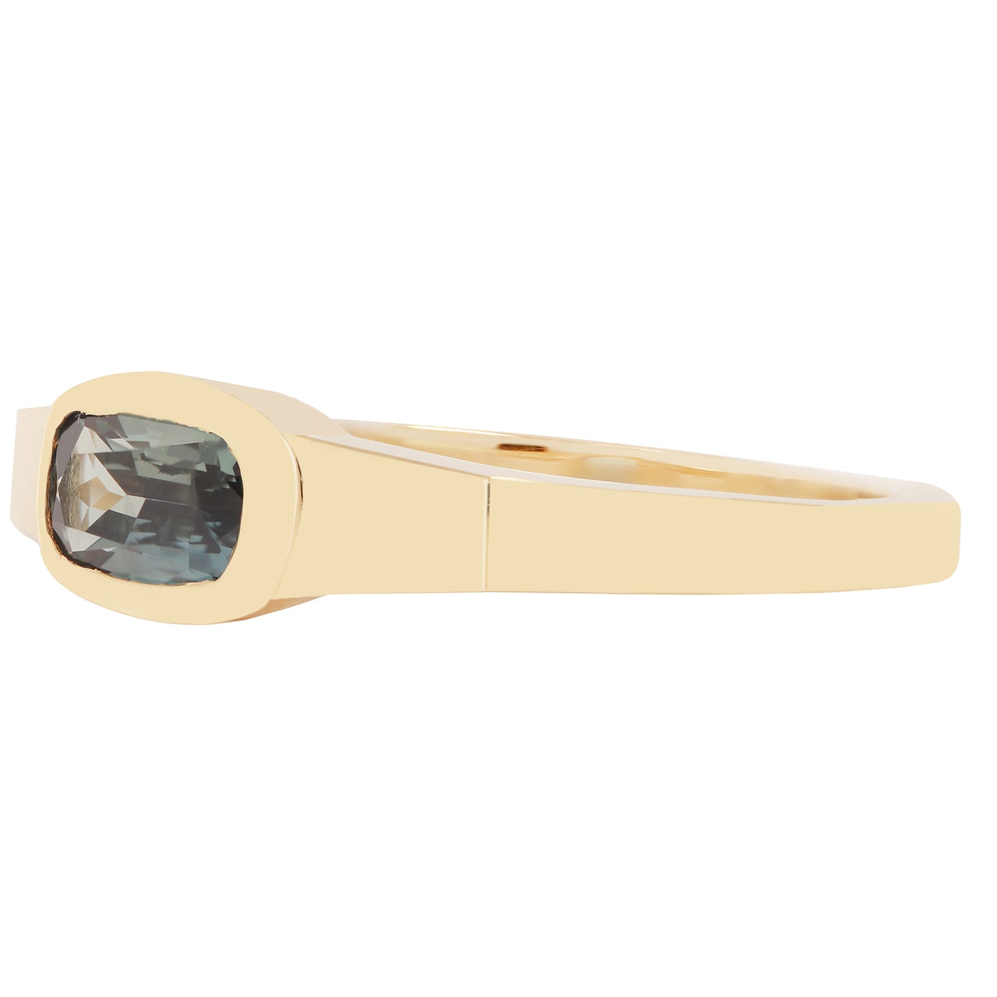 Lauren Wolf - Gold ring with a blue gemstone on a white background