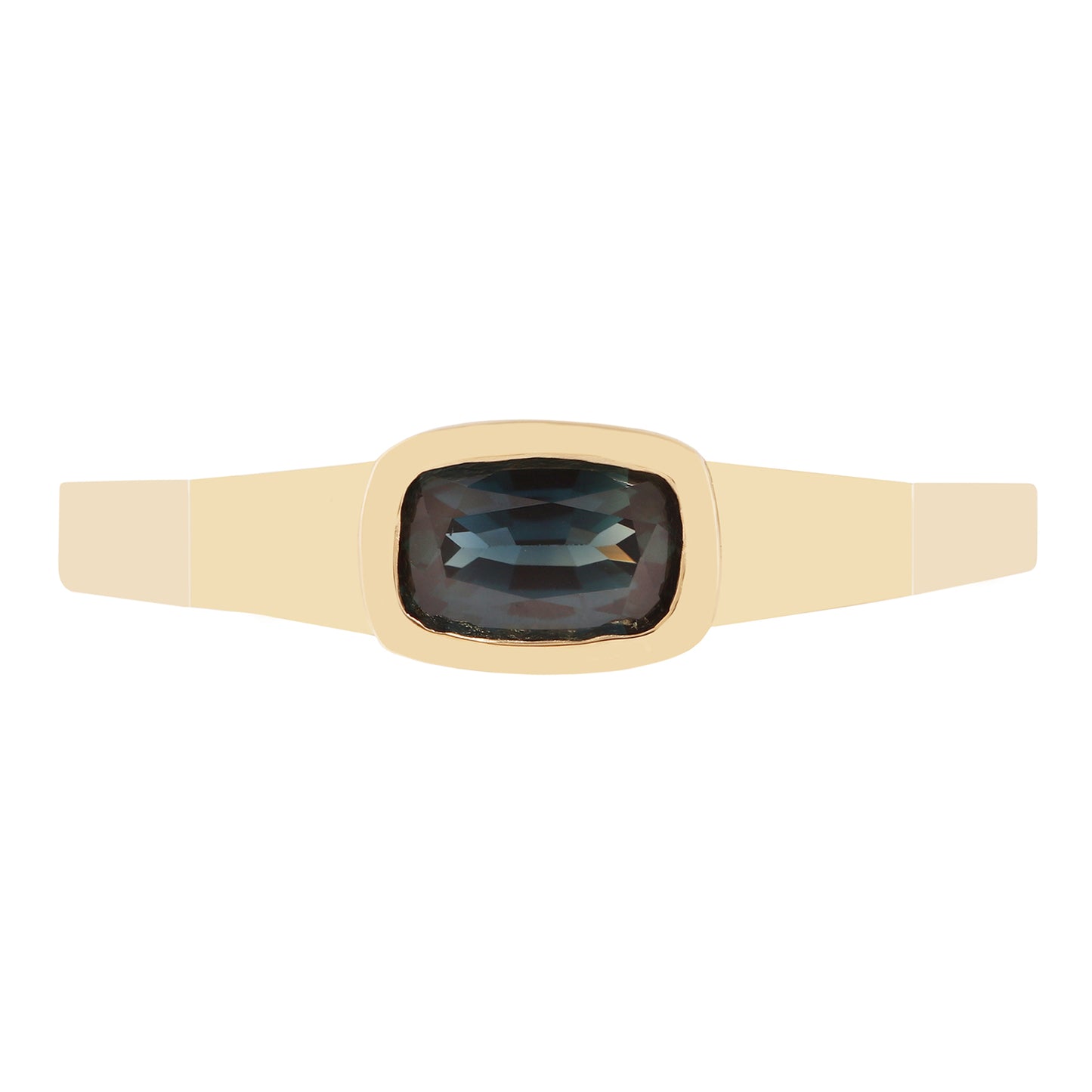 Lauren Wolf - Gold ring with a dark sapphire on a white background