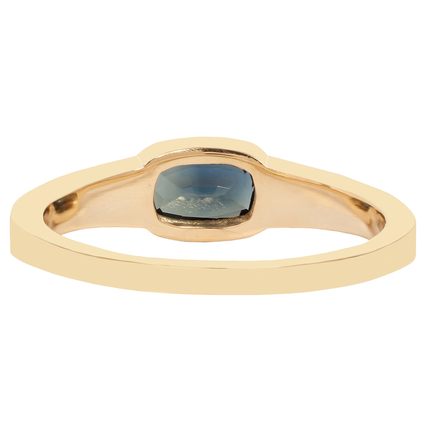 Lauren Wolf - Gold ring with a blue gemstone on a white background