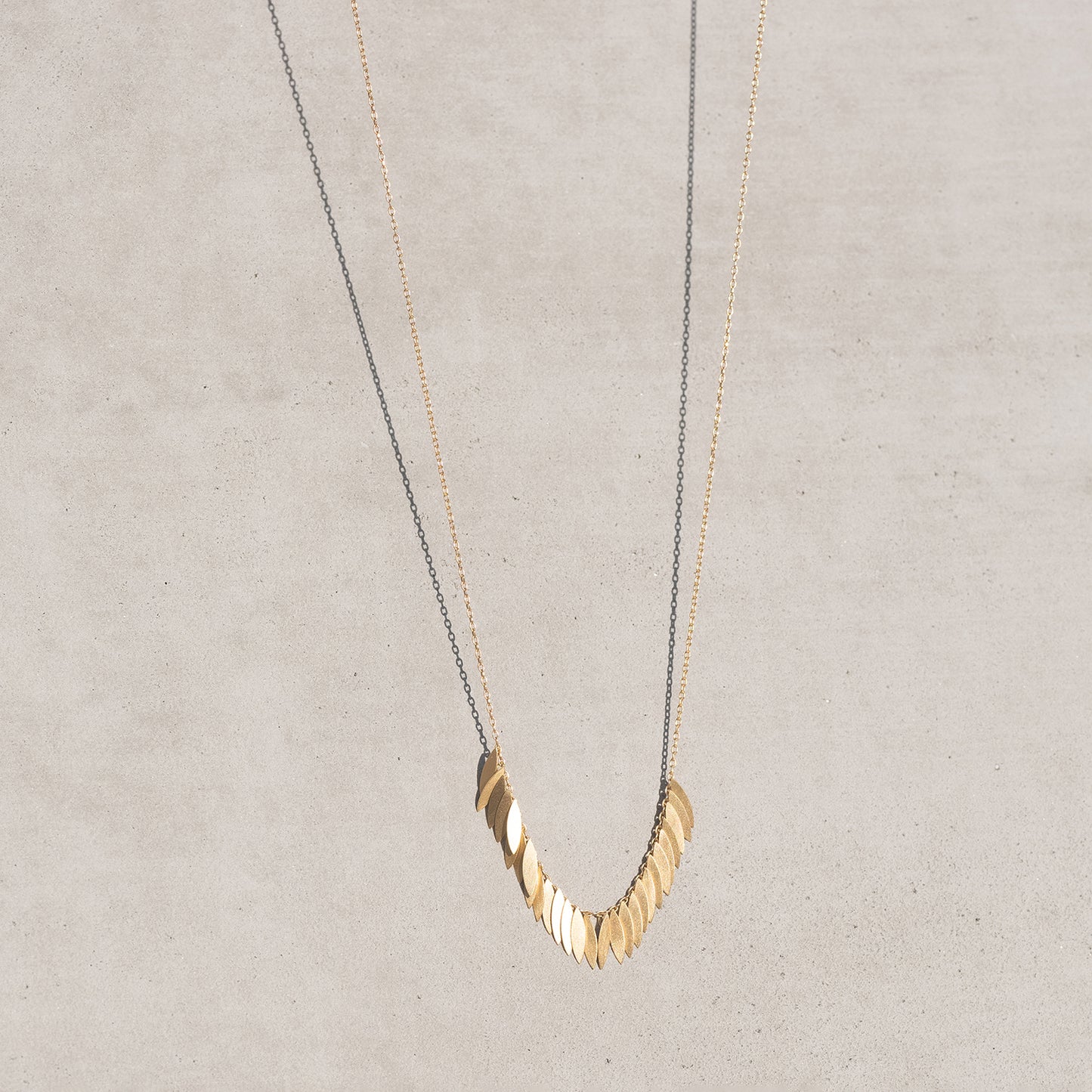 Golden Leaf Arc Necklace