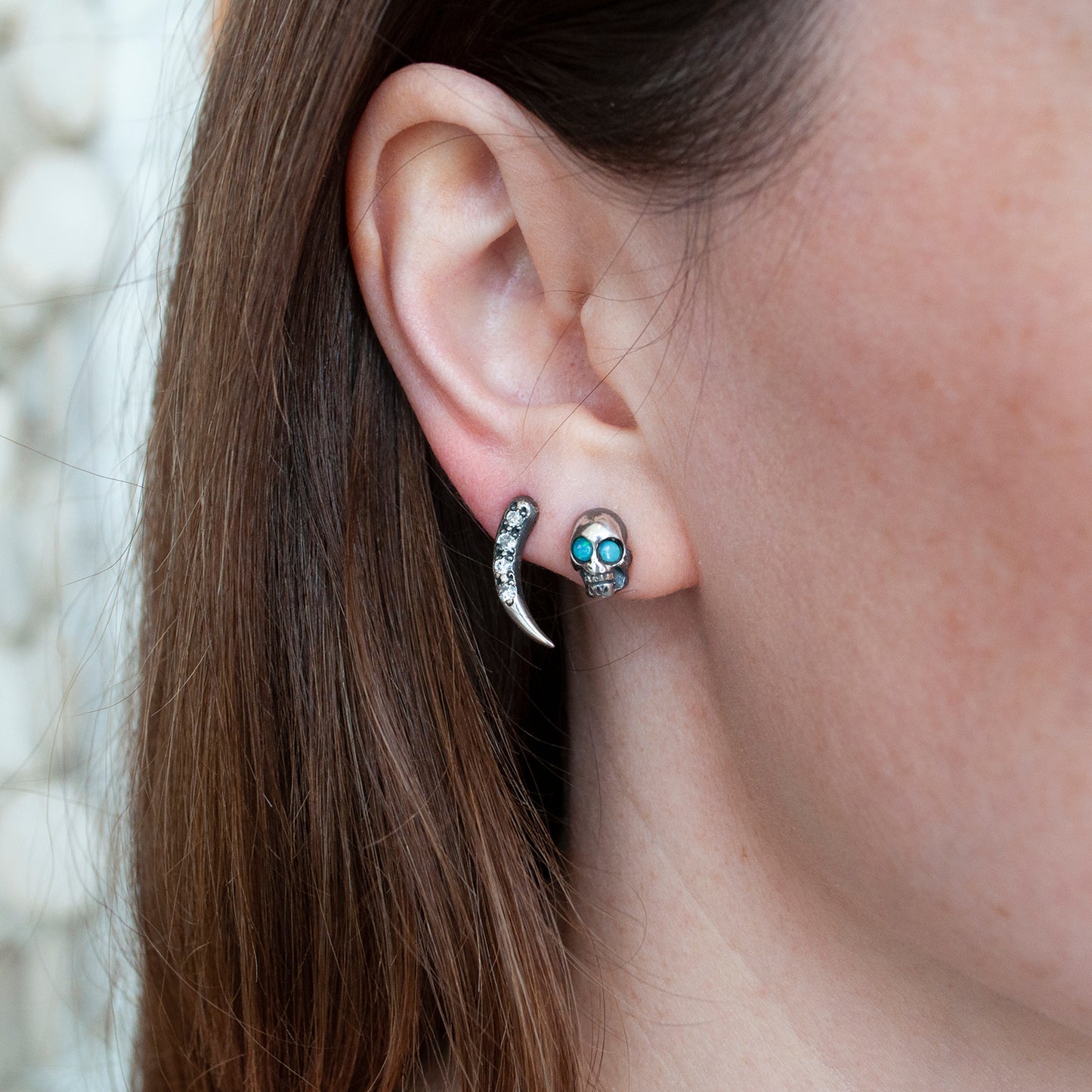 Opal Eyed Skull Studs