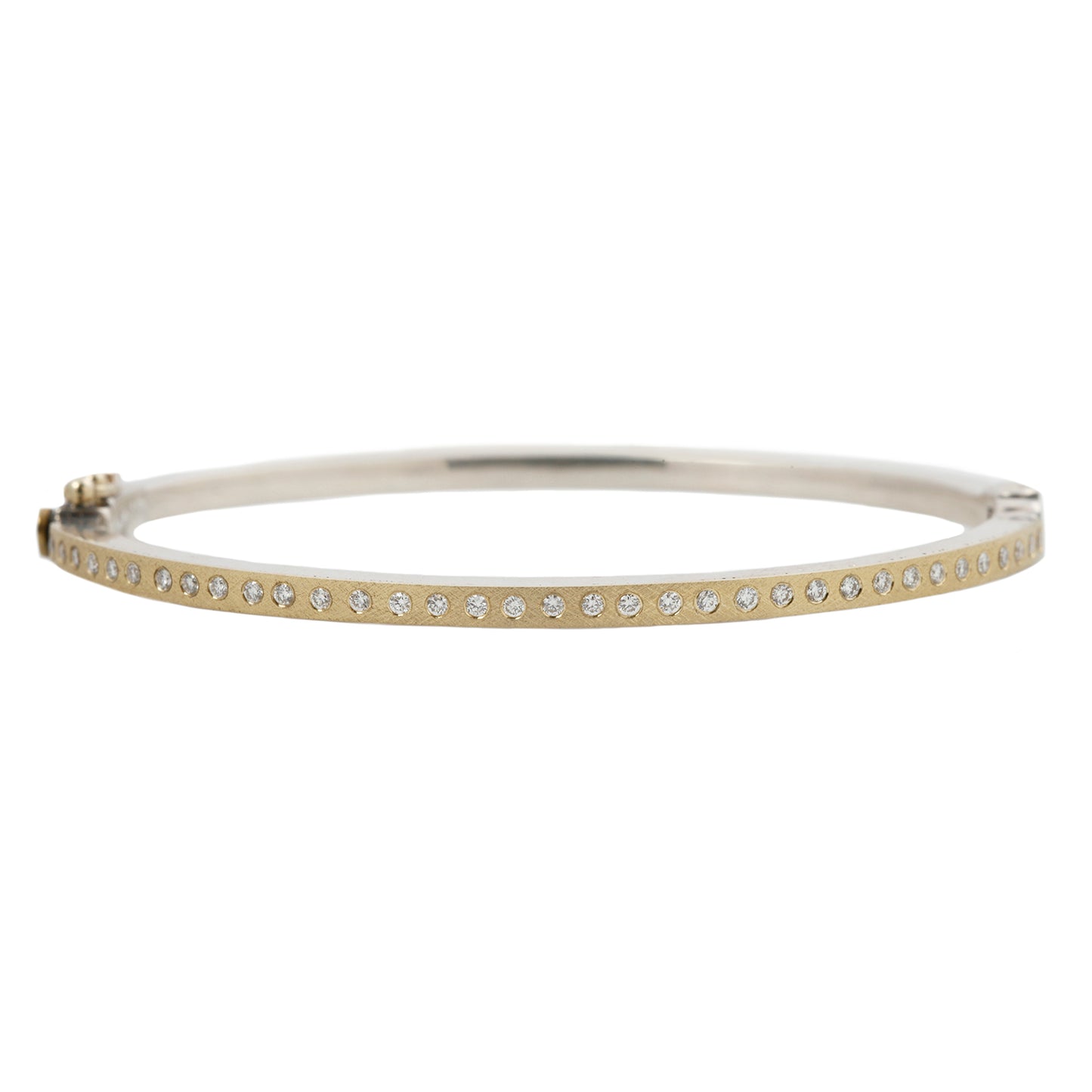 Rene Escobar - Gold bangle with small diamonds on a white background