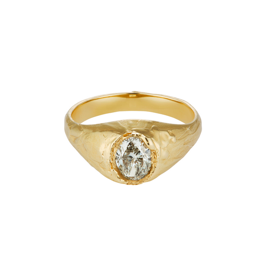 Ellis Mhairi Cameron - Gold ring with a central gemstone on a white background