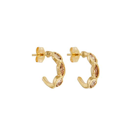 Ellis Mhairi Cameron - Gold hoop earrings with small diamonds on a white background