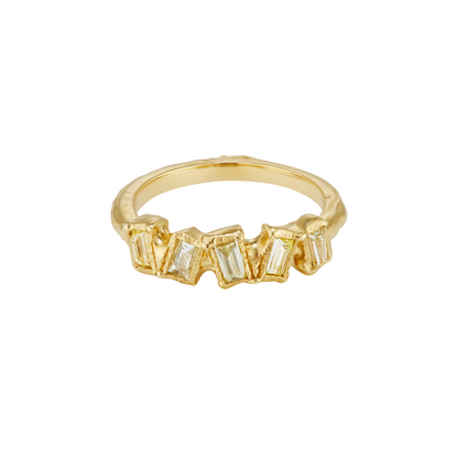 Ellis Mhairi Cameron - Gold ring with baguette-cut gemstones on a white background