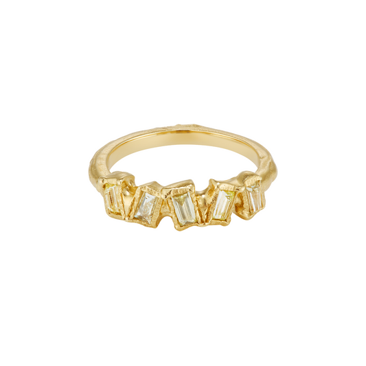Ellis Mhairi Cameron - Gold ring with baguette-cut gemstones on a white background
