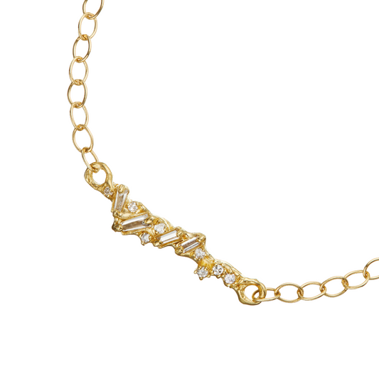 Ellis Mhairi Cameron - Gold necklace with diamond accents on a white background