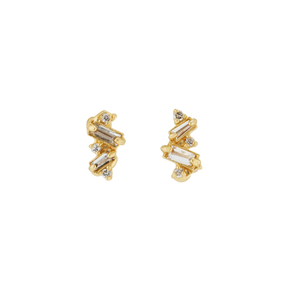 A pair of gold-toned stud earrings featuring baguette and round clear diamonds, displayed on a clean white background.