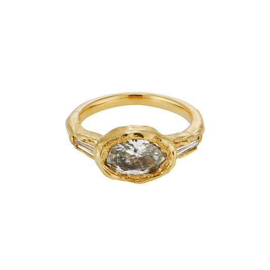 Ellis Mhairi Cameron - Gold ring with a central diamond and smaller stones on a white background