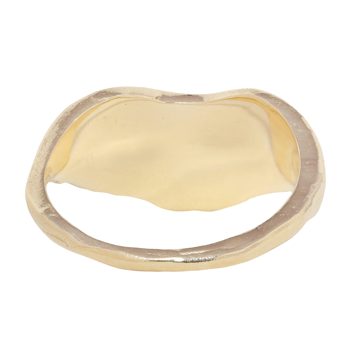 A gold ring featuring a wavy, organic shape with multiple baguette-cut clear diamonds set across the top, shown against a plain white background.