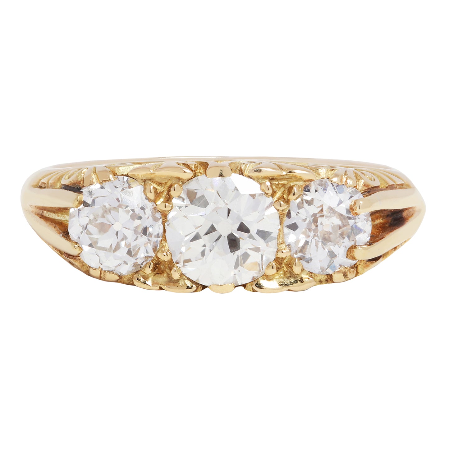 antique old ring with three diamonds on a white background