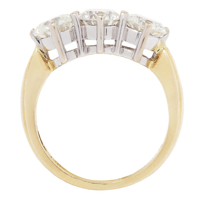 Gold and white gold ring with diamonds on a white background