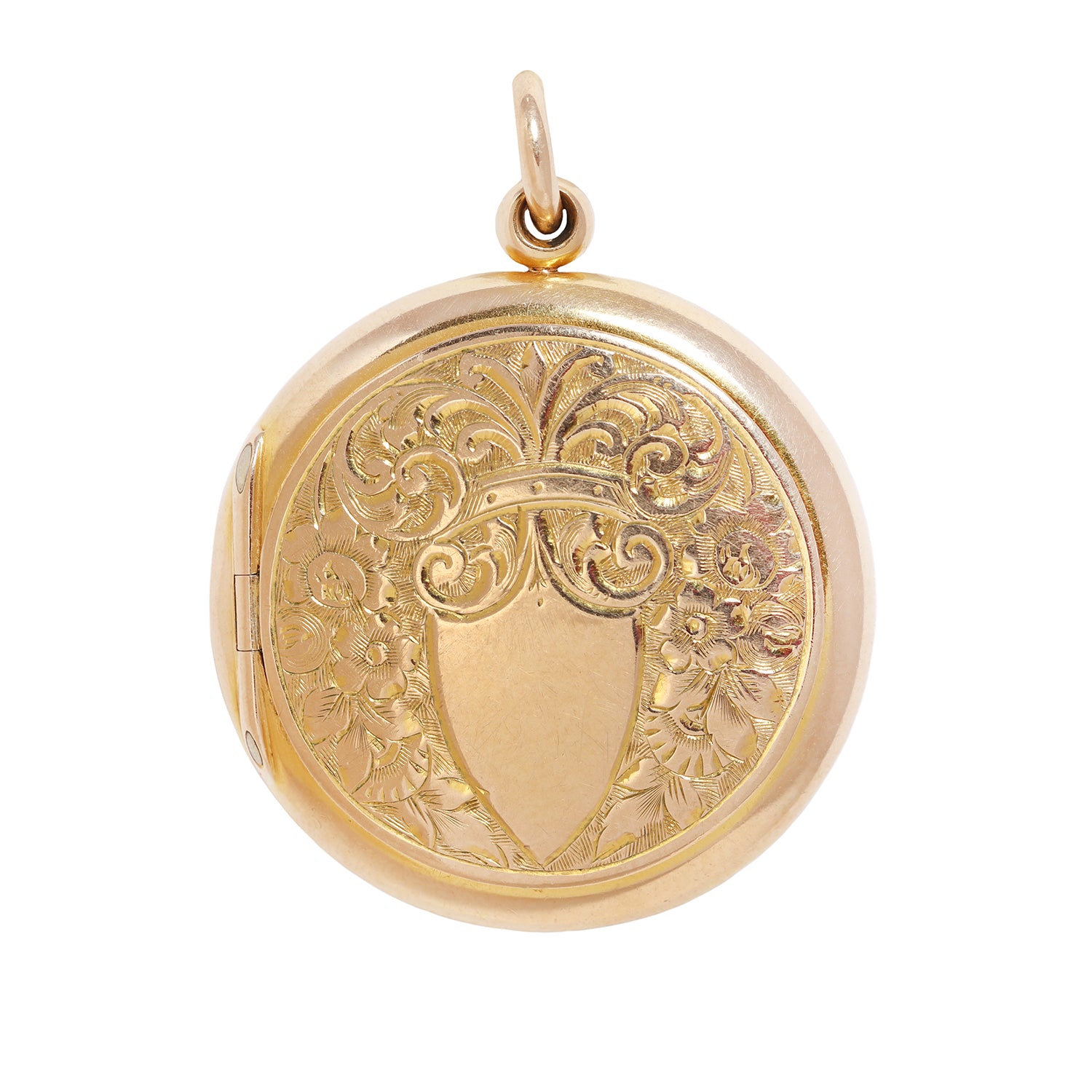A round yellow gold locket pendant with an engraved floral pattern and a blank shield in the center, shown on a plain white background.