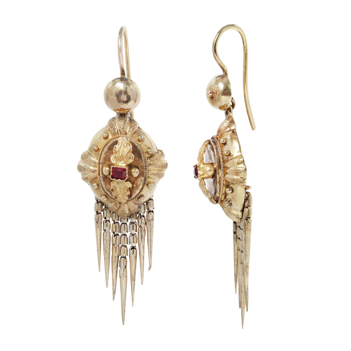 Antique gold earrings with ruby at the center and fringe at the bottom on white background