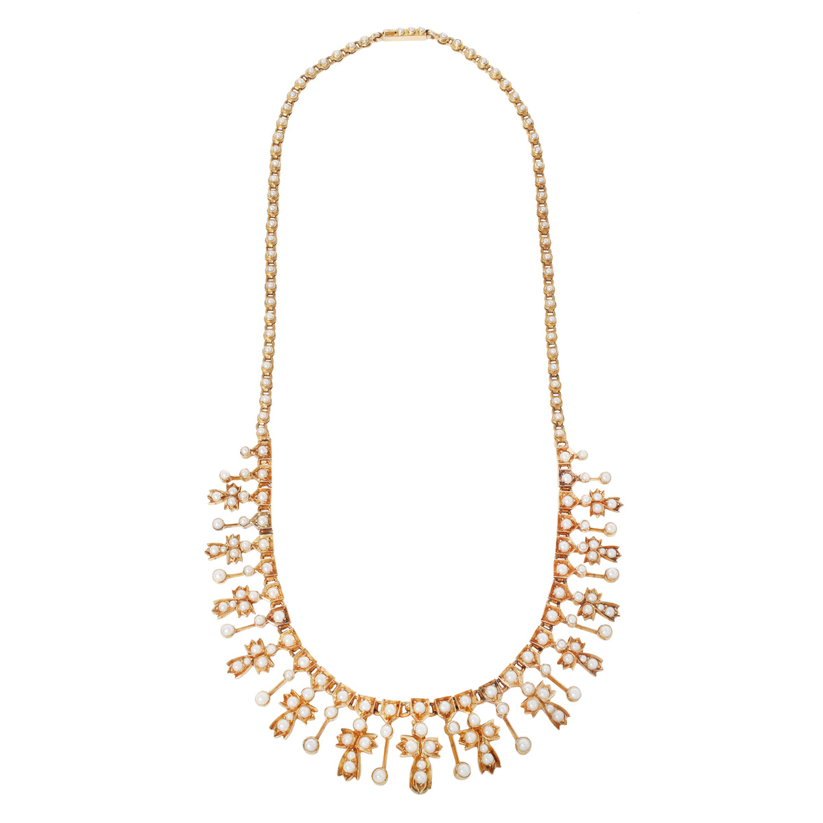 A gold statement necklace featuring a delicate chain, a wide collar of small round pearls, and multiple dangling floral and leaf motifs embellished with pesrls, shown against a plain white background.