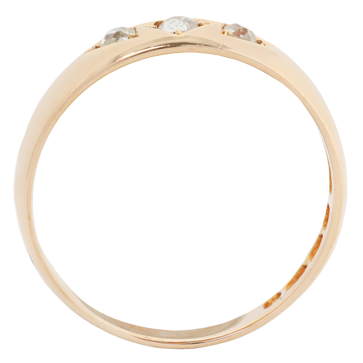 A yellow gold ring with three small clear gemstones set along the top band, shown against a plain white background.