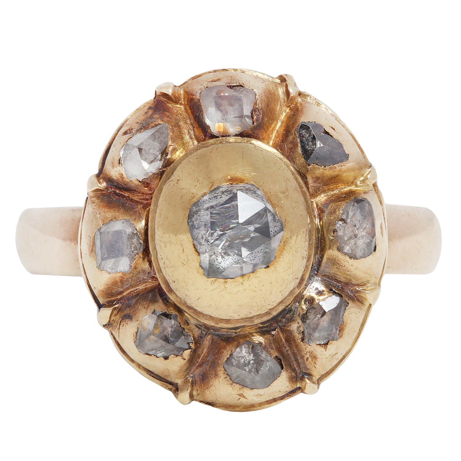 antique gold ring with embedded diamonds on a white background
