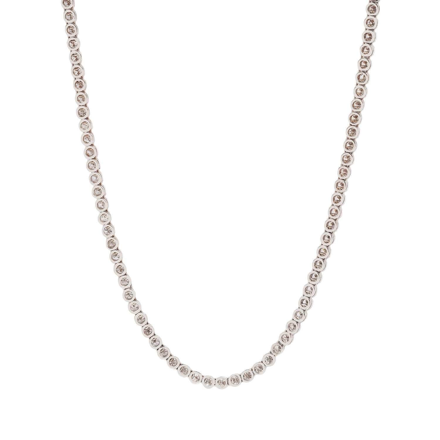 Vintage diamond tennis necklace on a white background