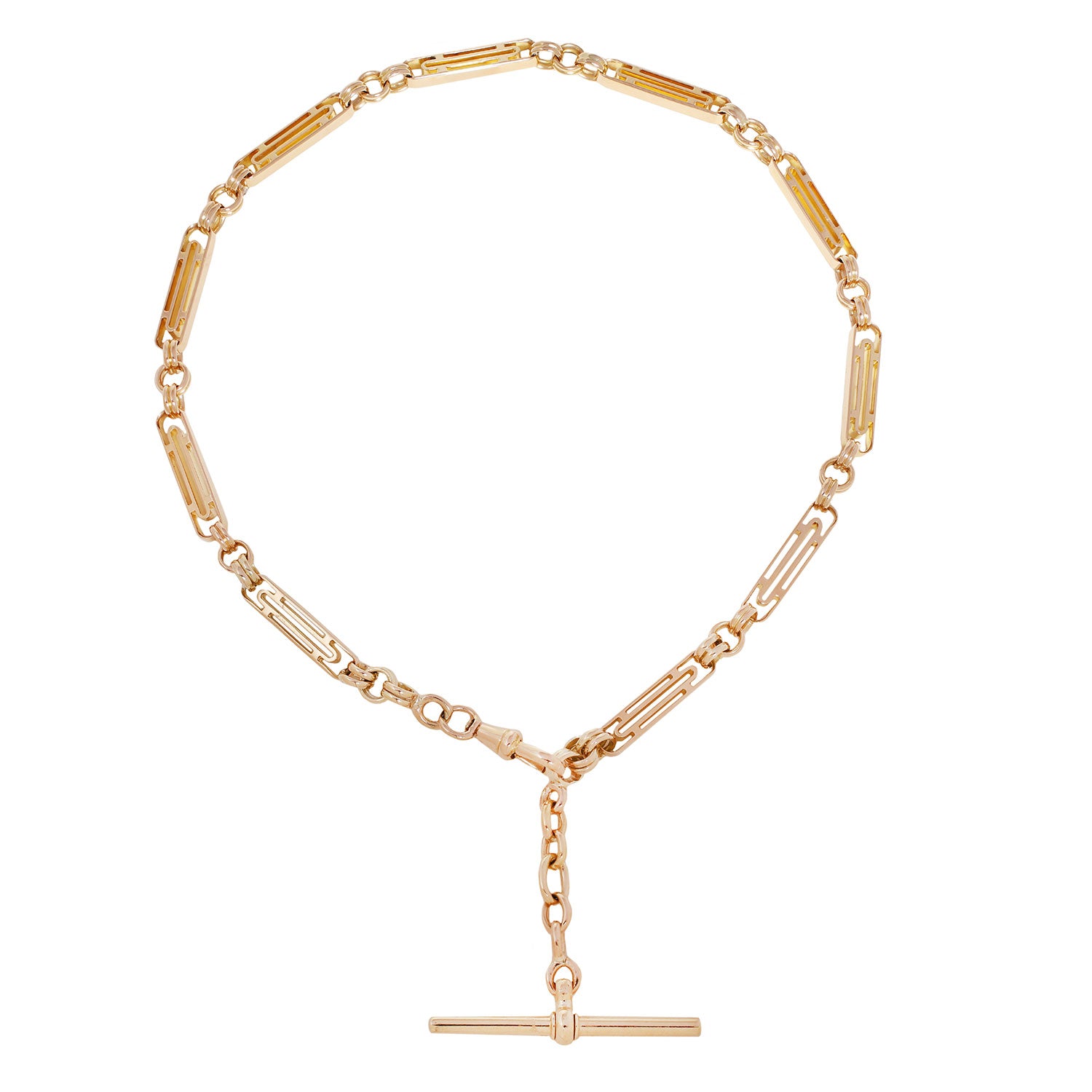 A gold-toned chain necklace with a unique link design featuring alternating cylindrical and rectangular segments, with a short hanging chain and a horizontal bar pendant at the bottom center, shown on a plain white background.