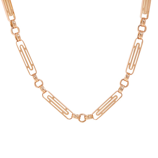 A rose gold paperclip link chain necklace displayed in a curved shape against a solid white background.