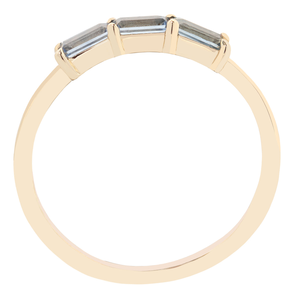 A yellow gold ring with three rectangular baguette-cut clear gemstones in a three-stone setting, shown against a plain white background.