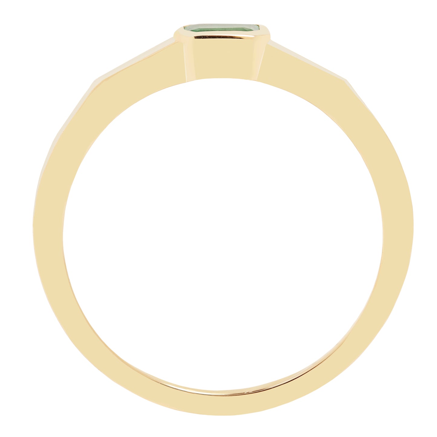 Gold ring with a green gemstone on a white background
