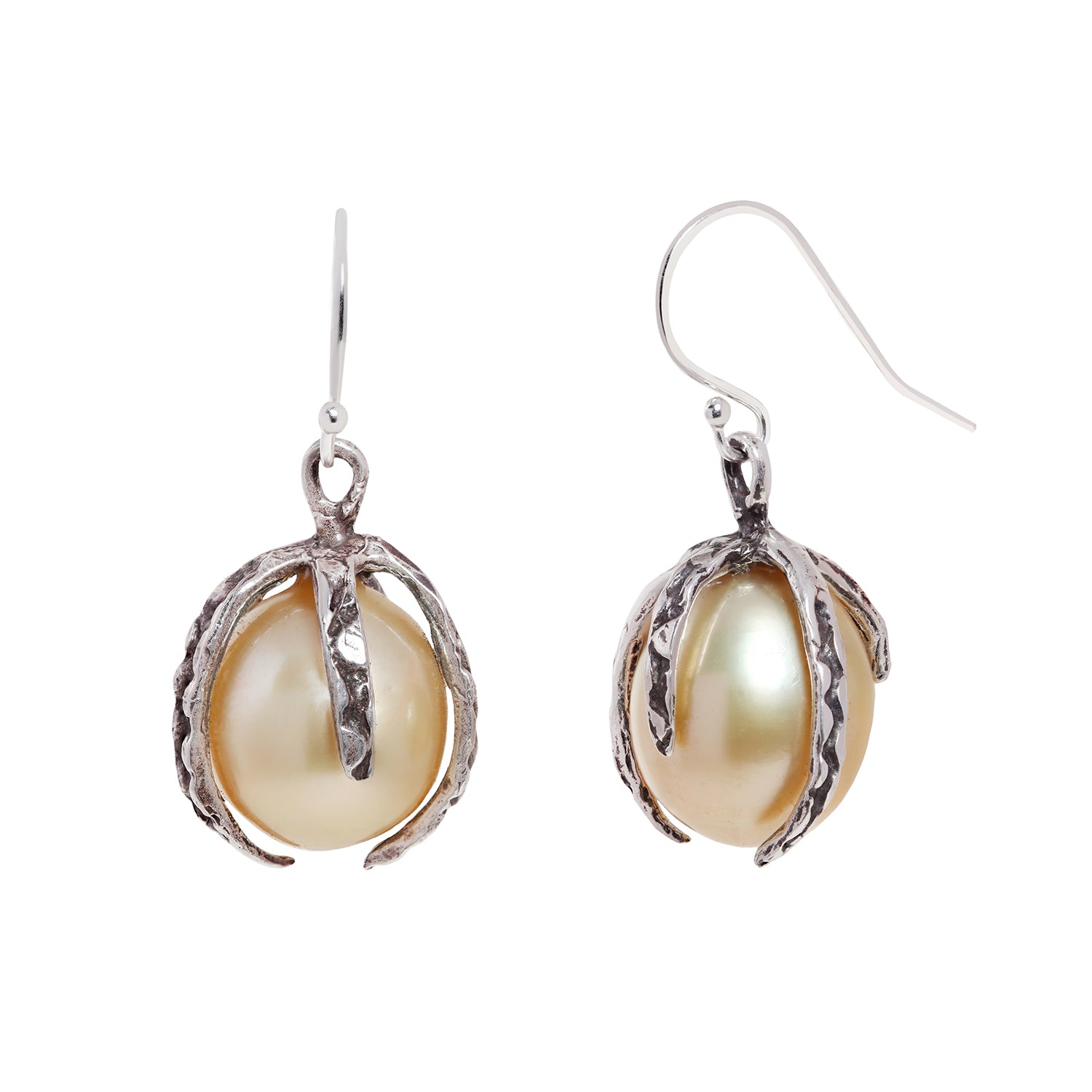 A pair of darkened silver drop earrings featuring large, lustrous baroque pearls nestled in textured, claw-like settings, shown against a plain white background.