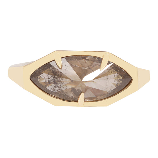 Lauren Wolf - Gold ring with a large, faceted gemstone on a white background