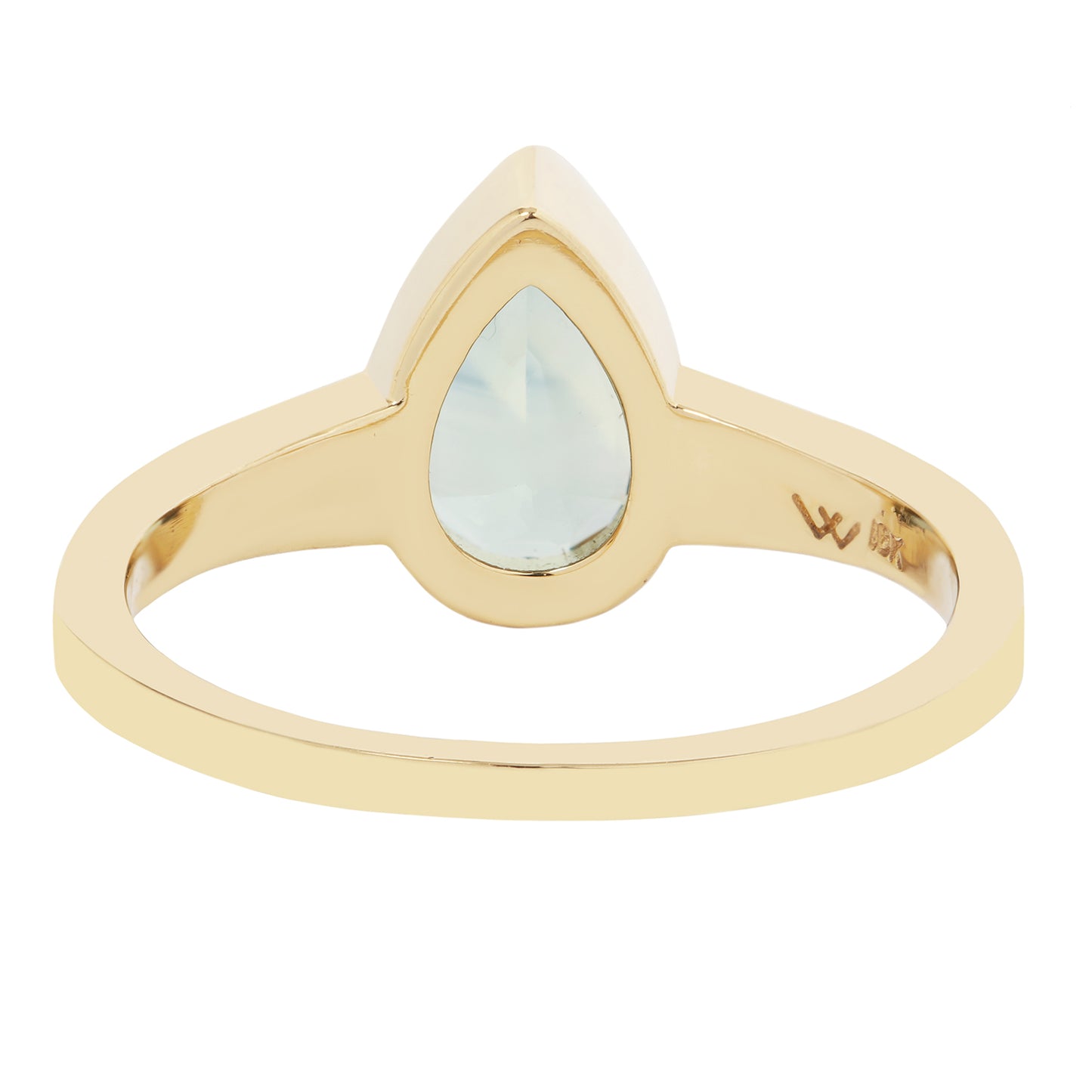 Gold ring with a teardrop-shaped light blue gemstone on a white background
