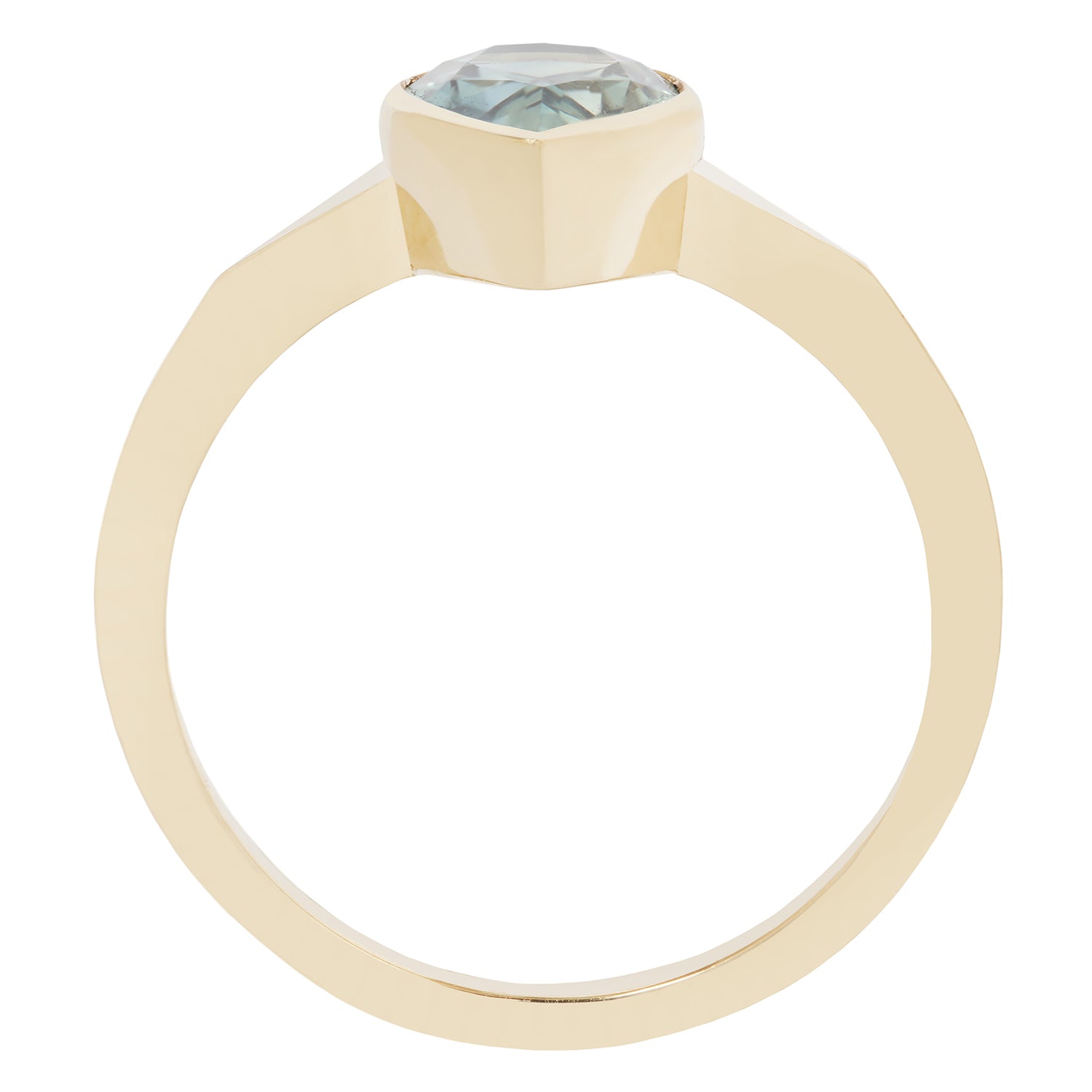 Gold ring with a green gemstone on a white background