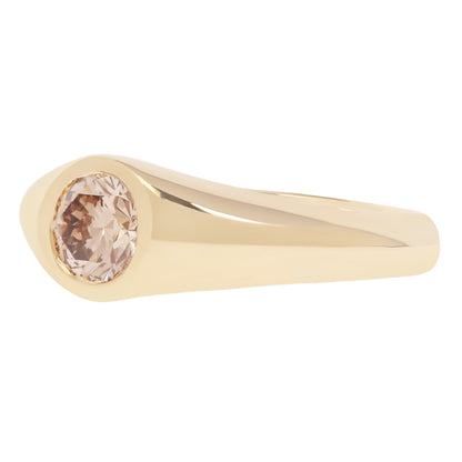 Lauren Wolf - Gold ring with a champagne diamond on a white background