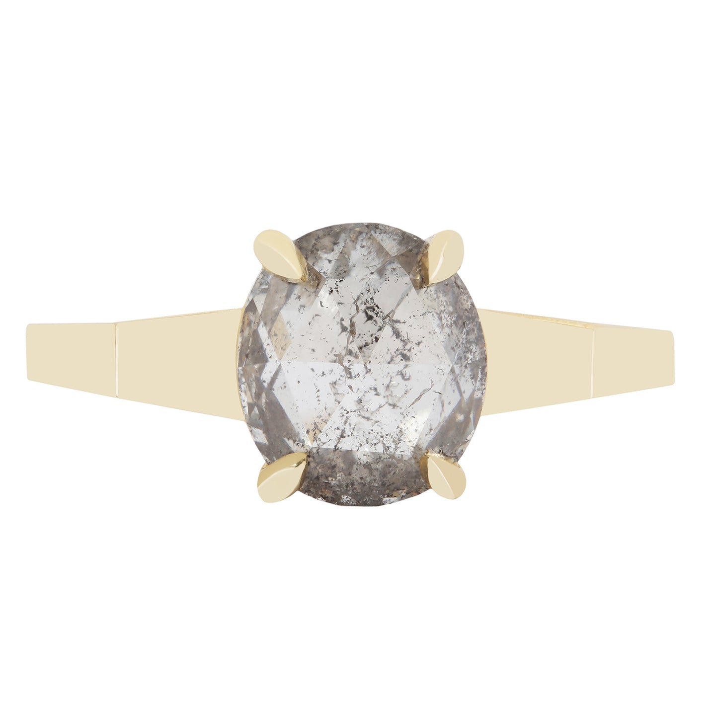 Ring with a large oval diamond and gold band on a white background