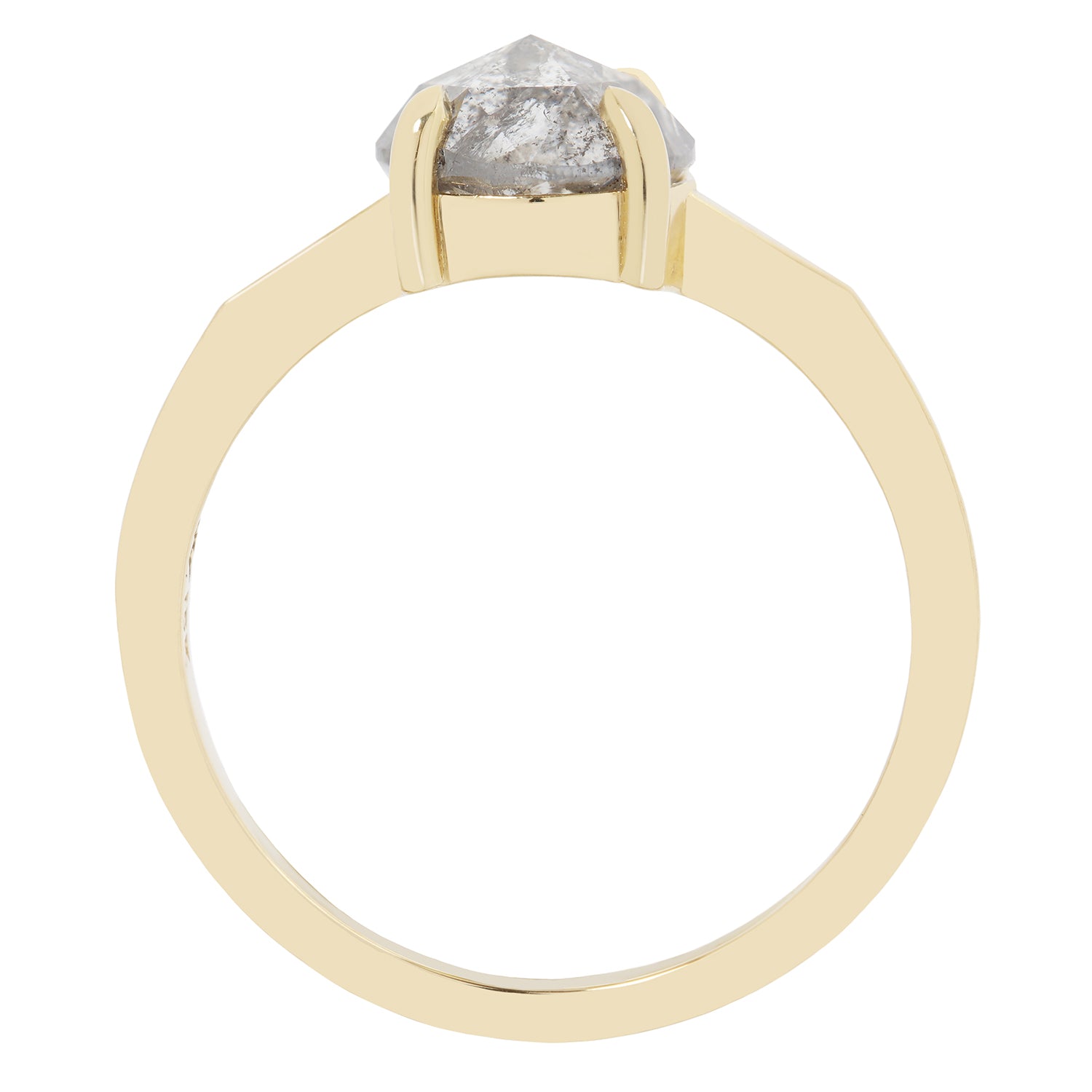 Gold ring with a gray diamond on a white background