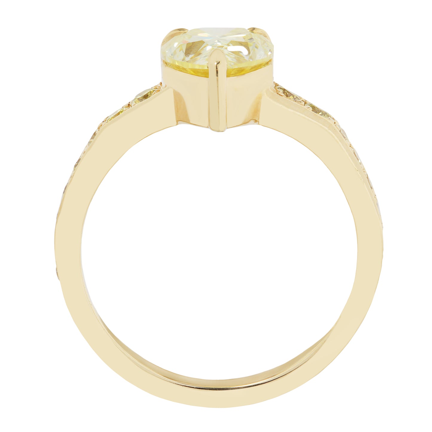 Gold ring with a yellow gemstone on a white background