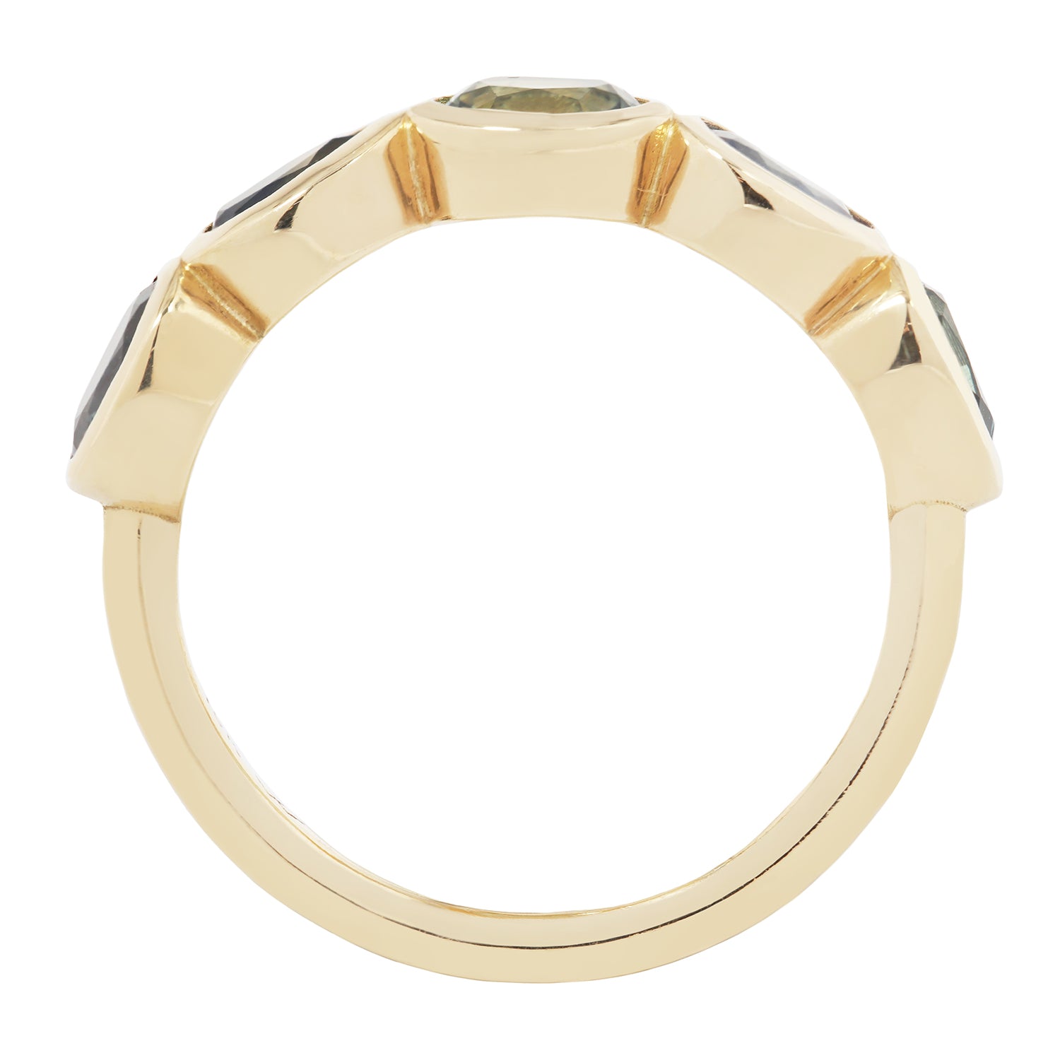 Gold ring with gemstones on a white background