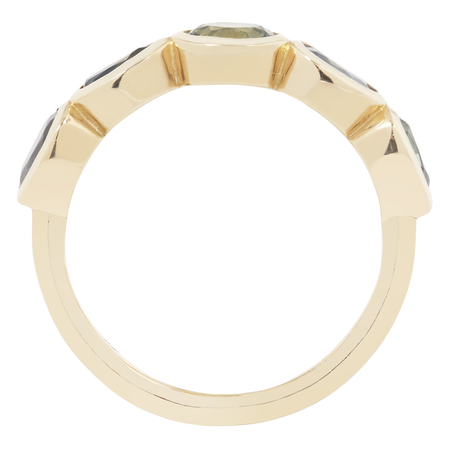 Gold ring with embedded stones on a white background