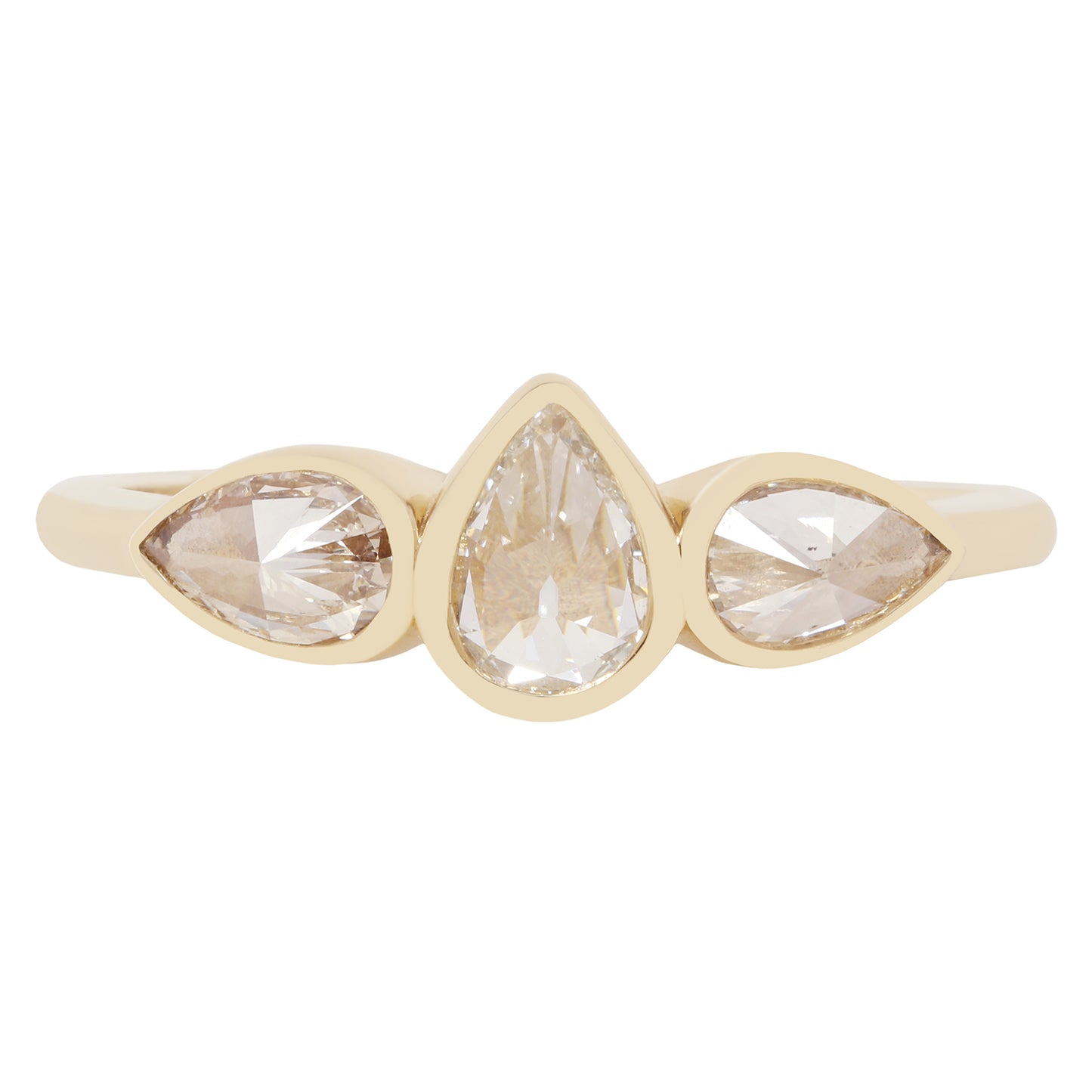A gold ring featuring three marquise-cut clear gemstones set in a row, with a pear-shaped center stone and two smaller marquise stones on either side, shown on a plain white background.