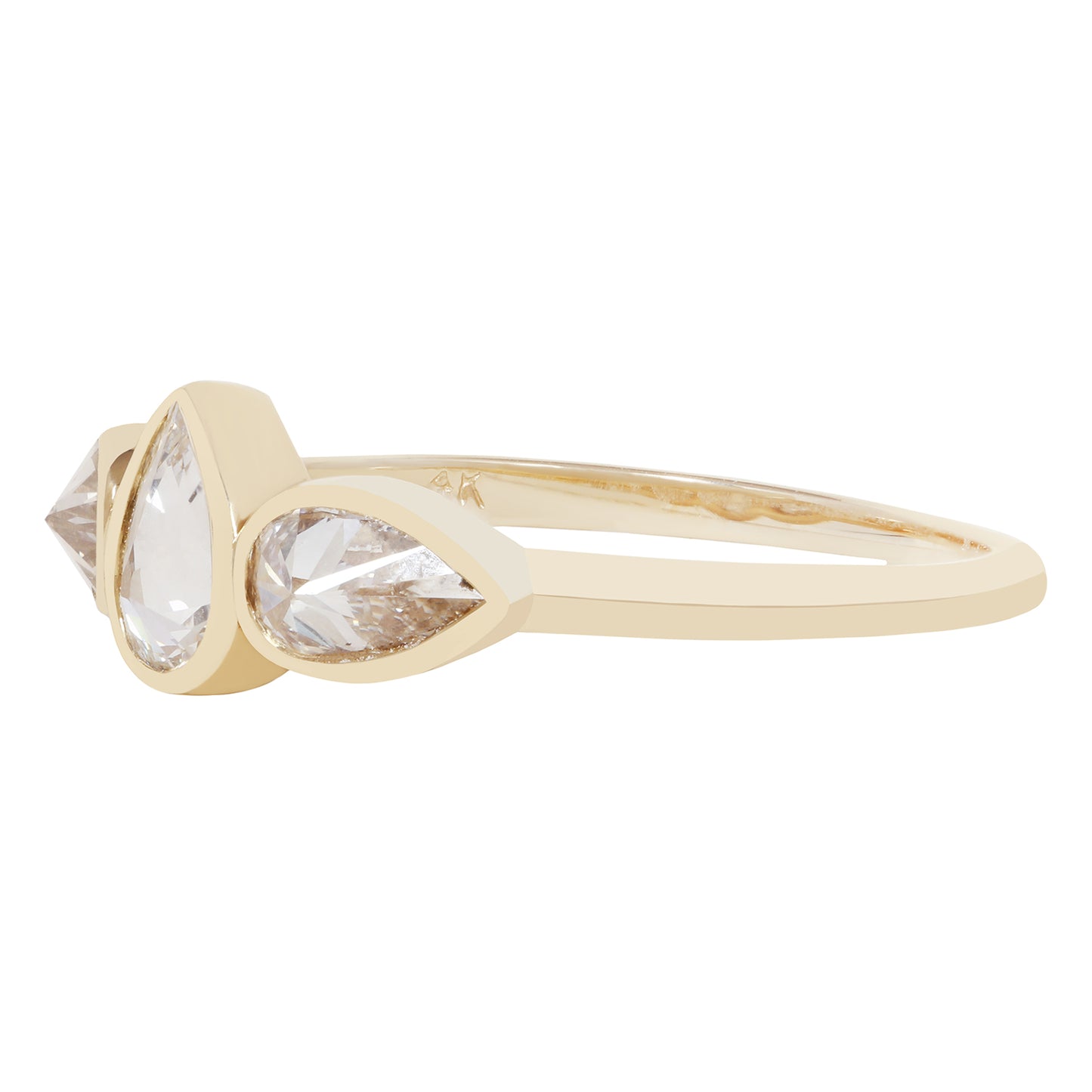 A gold ring featuring two pear-cut clear gemstones in a split setting, shown from a side profile on a plain white background.