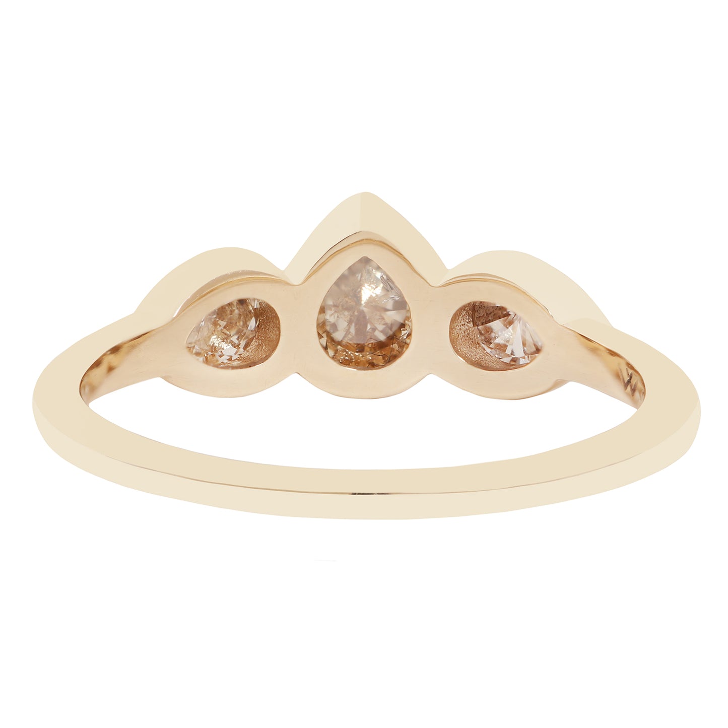 Three pear shape diamond ring in yellow gold on a white background
